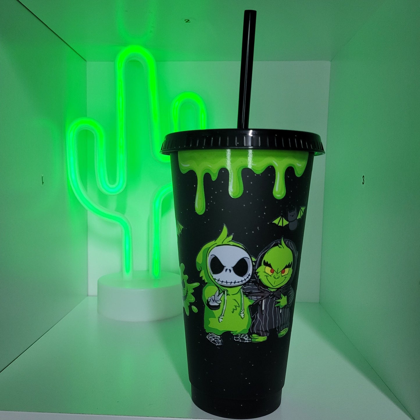 Black plastic tumbler with straw green halloween