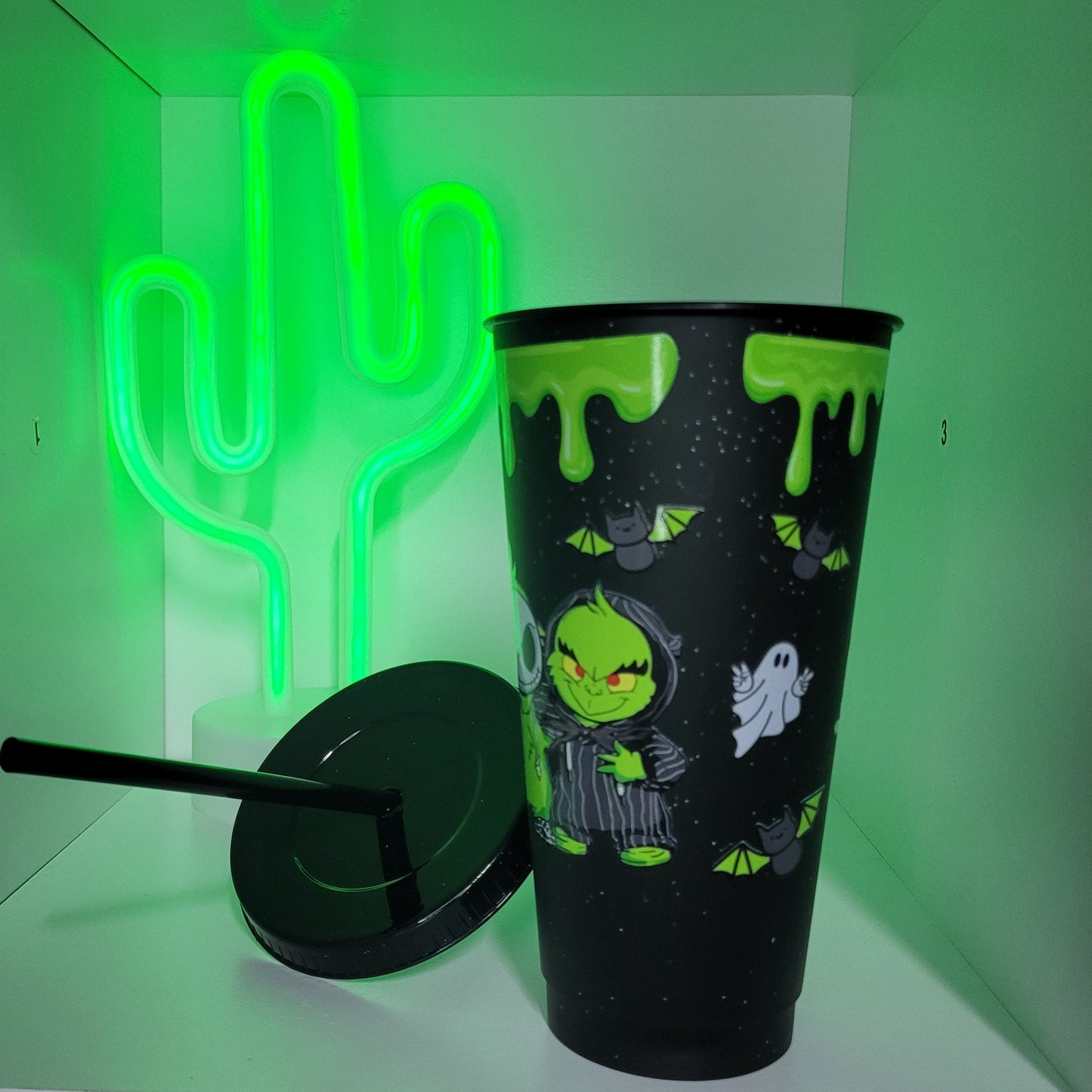 Black plastic tumbler with straw green halloween