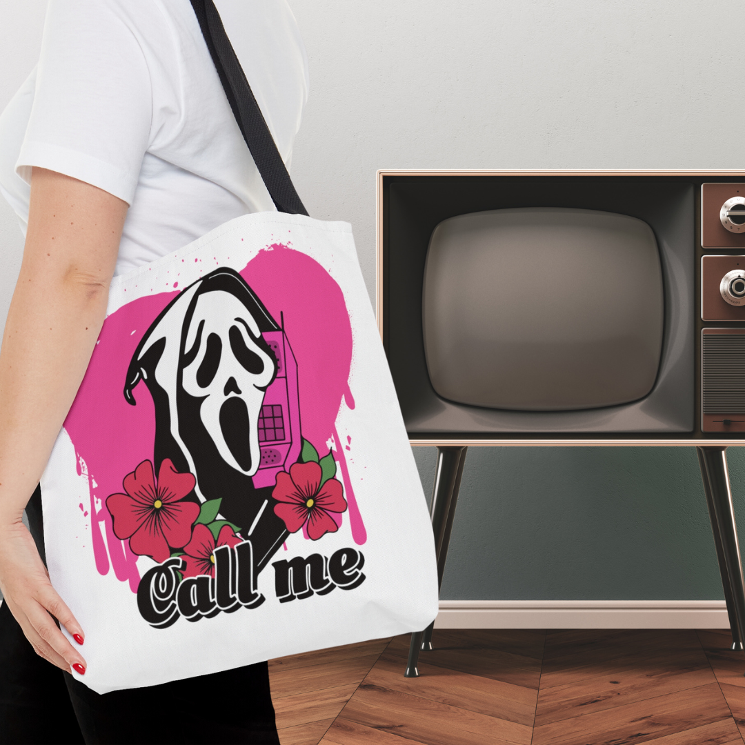 white tote bag with black handle. Ghostface scream killer character with a phone and the words call me