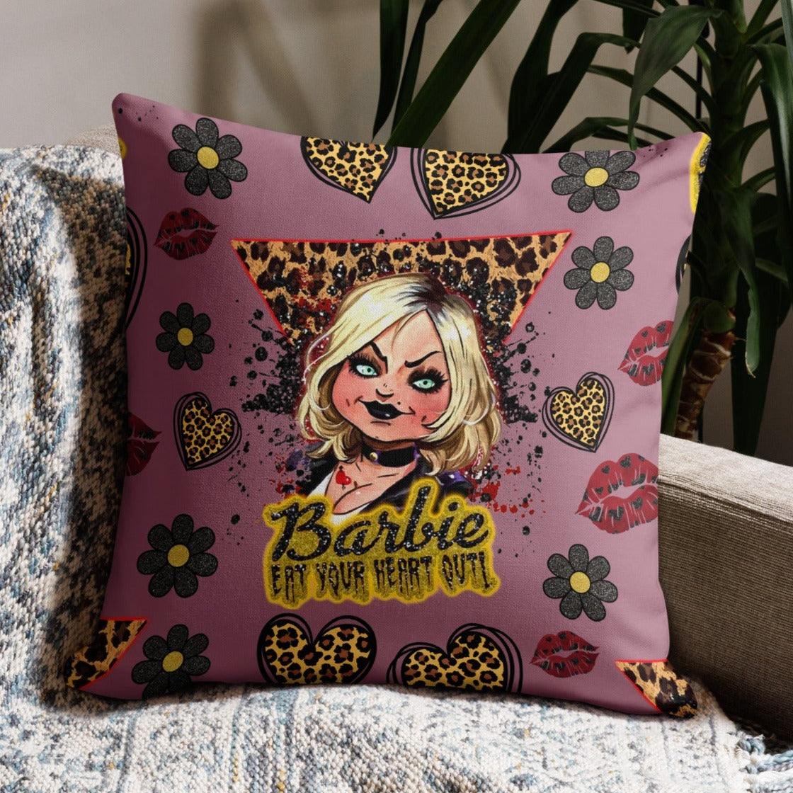 cushion with pink background and leopard print accents featuring tiffany the bride of chucky doll from the childs play horror franchise