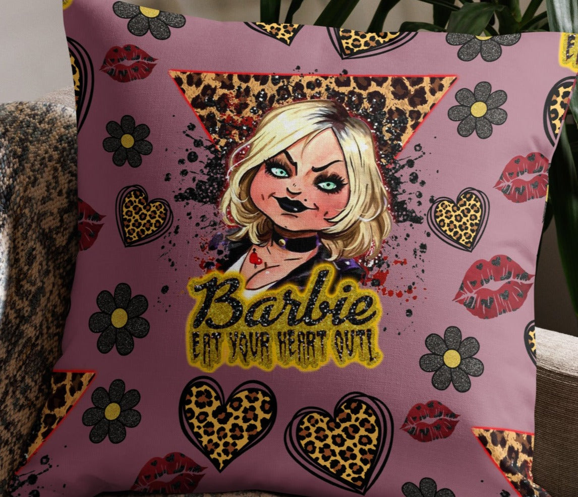 cushion with pink background and leopard print accents featuring tiffany the bride of chucky doll from the childs play horror franchise