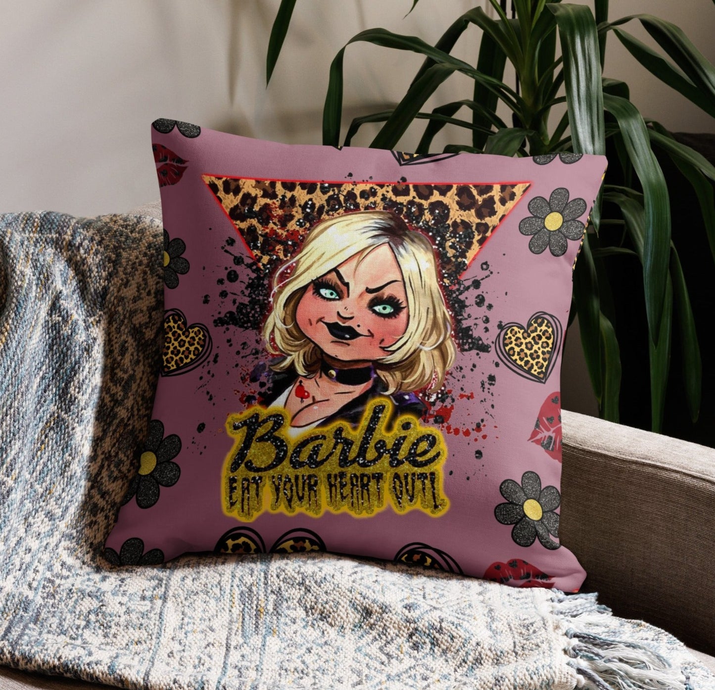 cushion with pink background and leopard print accents featuring tiffany the bride of chucky doll from the childs play horror franchise