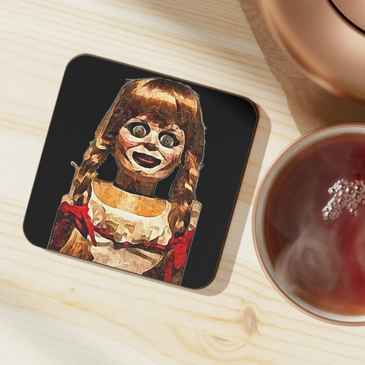 coaster featuring the spooky doll Annabelle from the conjuring movie