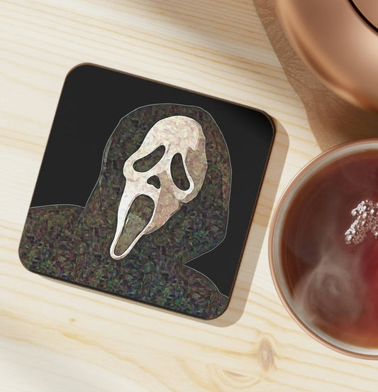 coaster with a black background and ghostface fromn the scream movie franchise